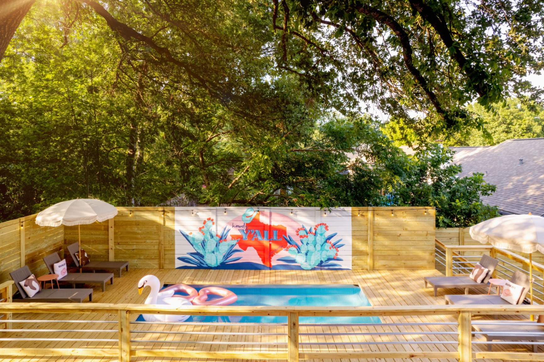 Howdy Y'all pool deck with mural